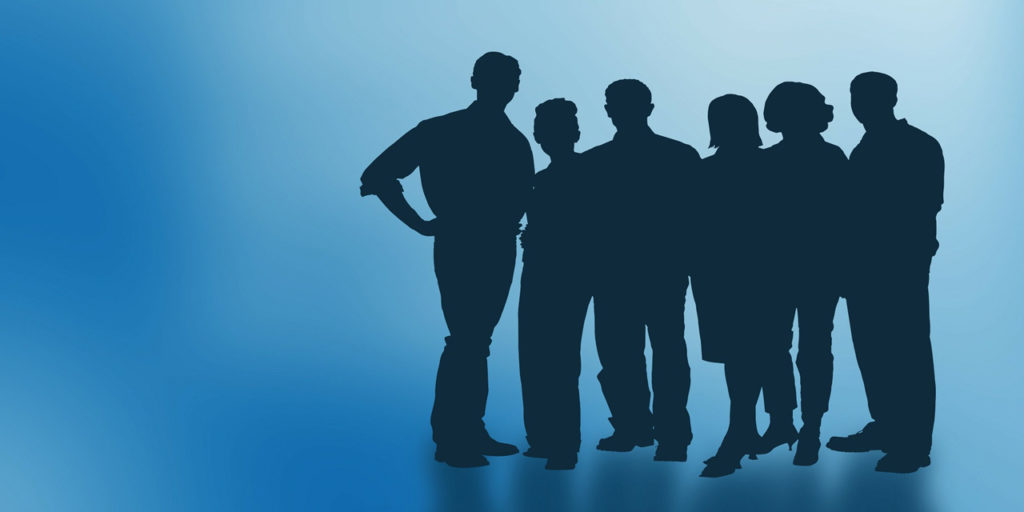 Group of six people in silhouette
